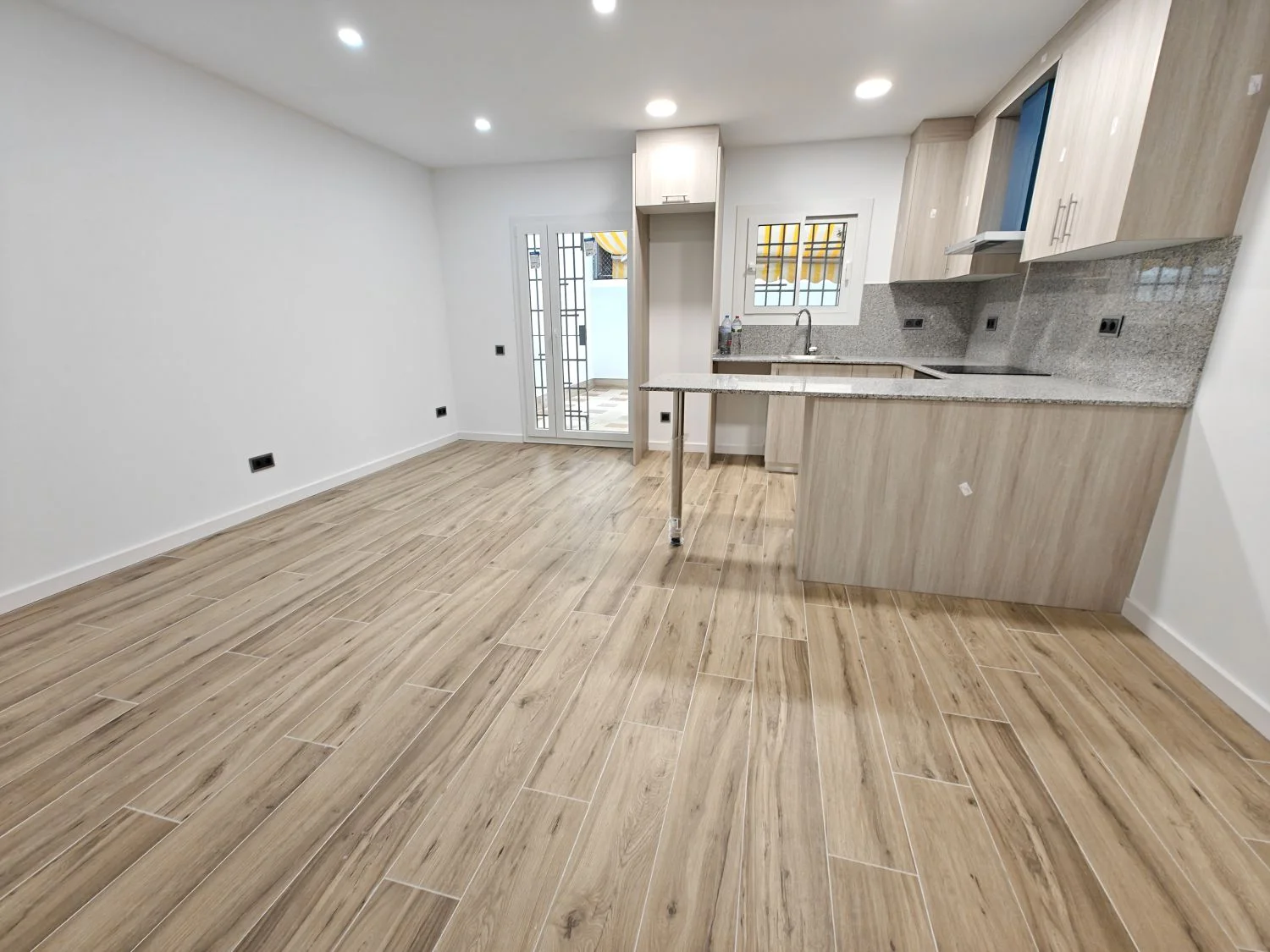 Reformed ground-floor flat with patio
