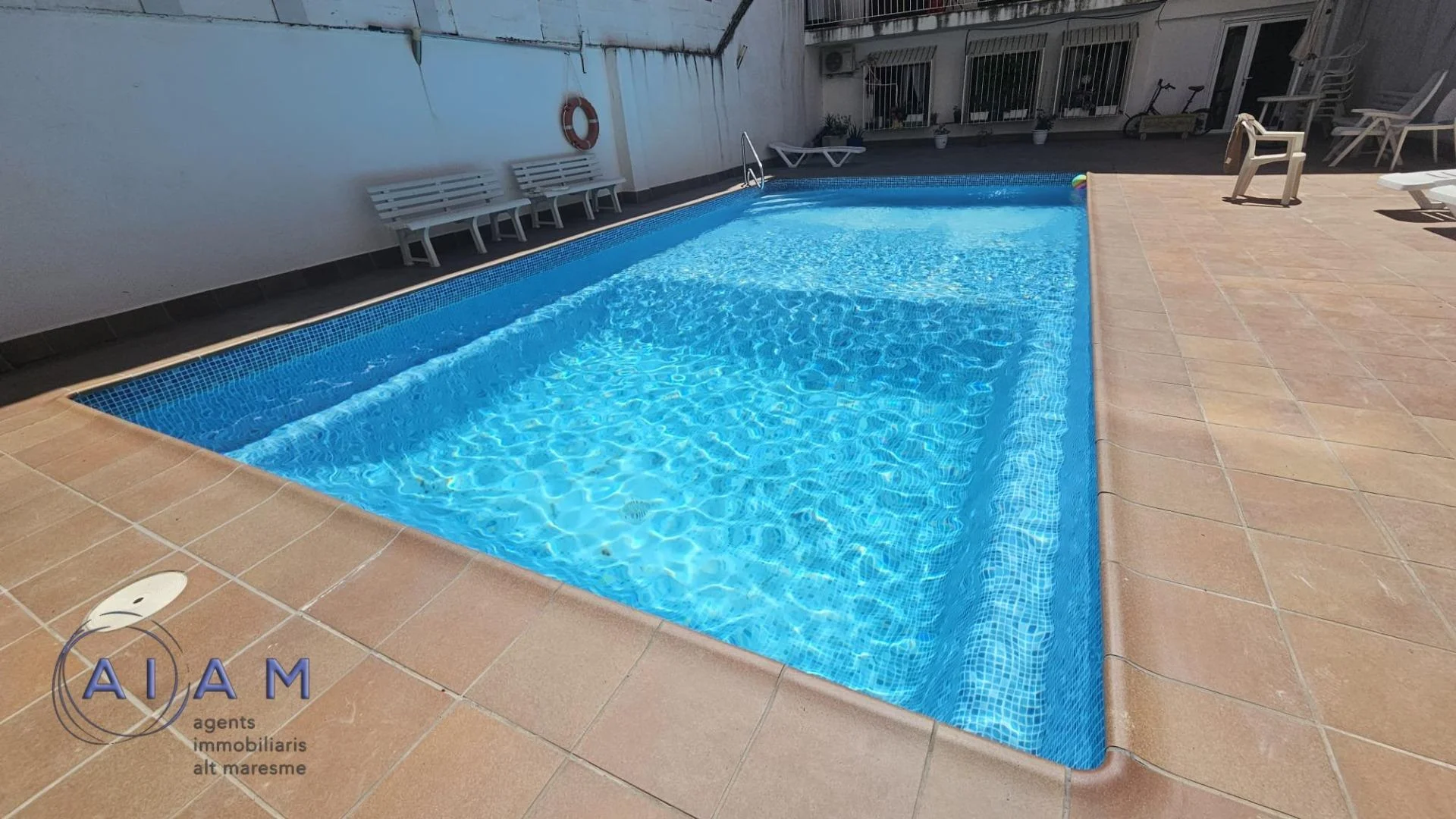 Centre flat with communal pool