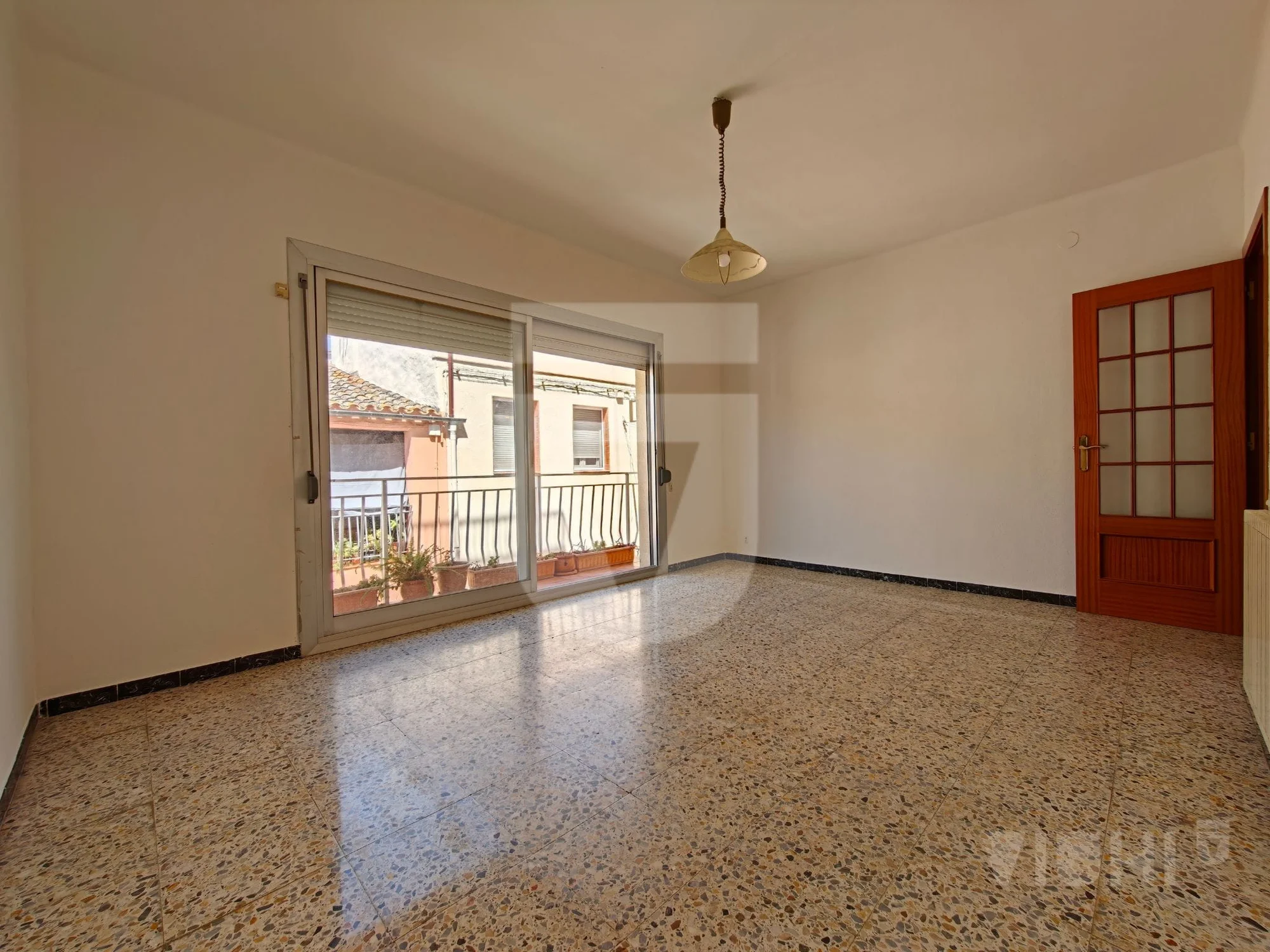 Piso céntrico en Tiana, tres habitaciones