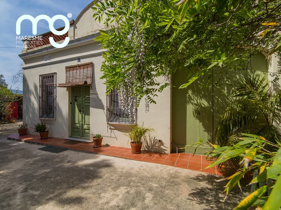 Historic masia with expansive rustic plot