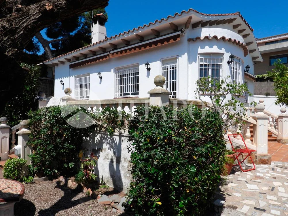 Casa de cuatro dormitorios con jardín privado
