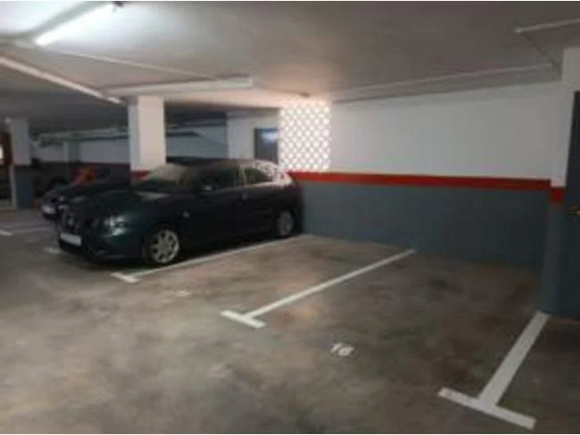 Two adjoining garage spaces near market