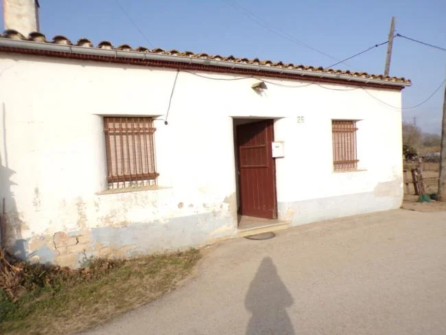Rustic land with unregistered house