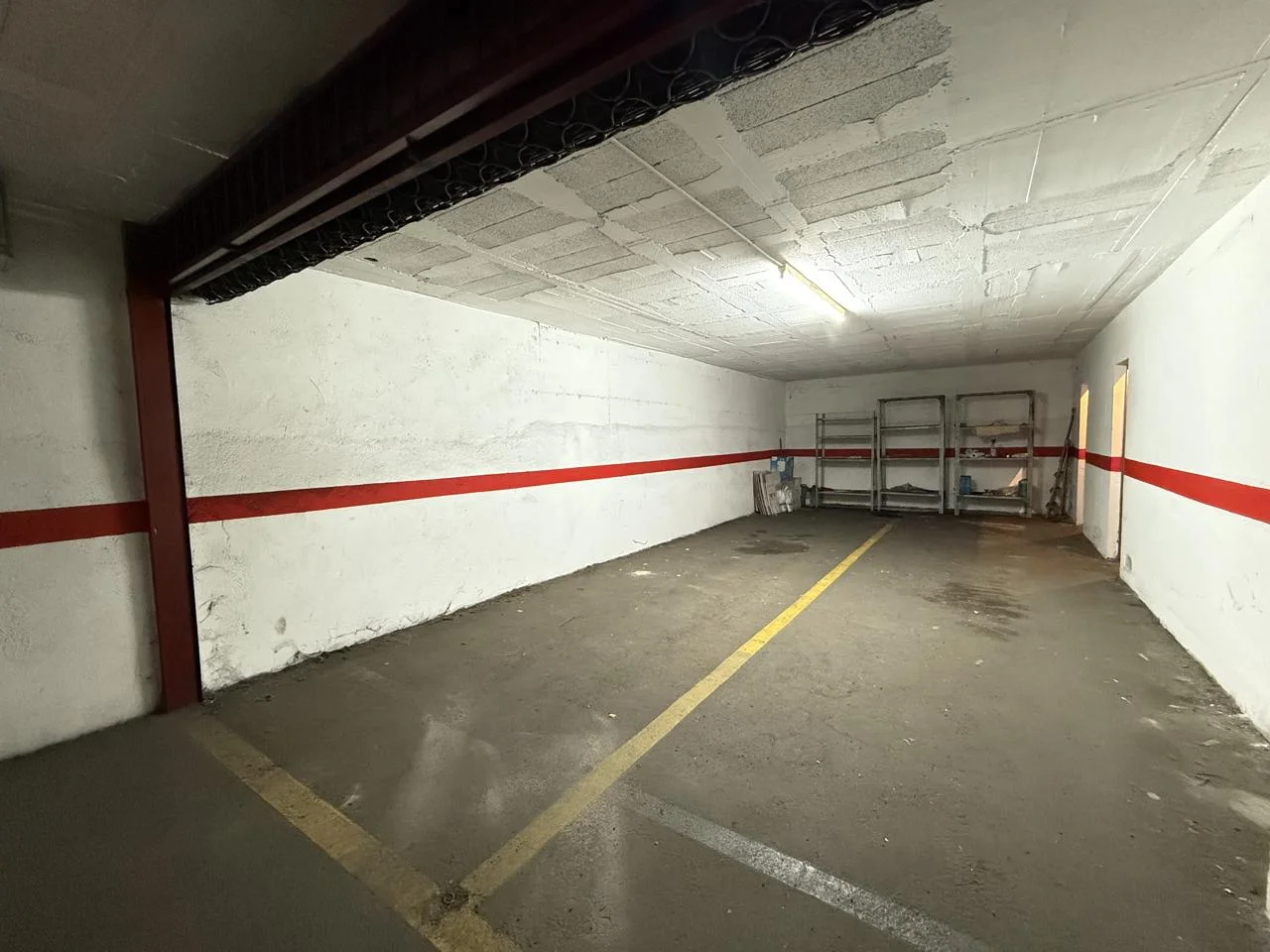 Four-car garage with storage rooms