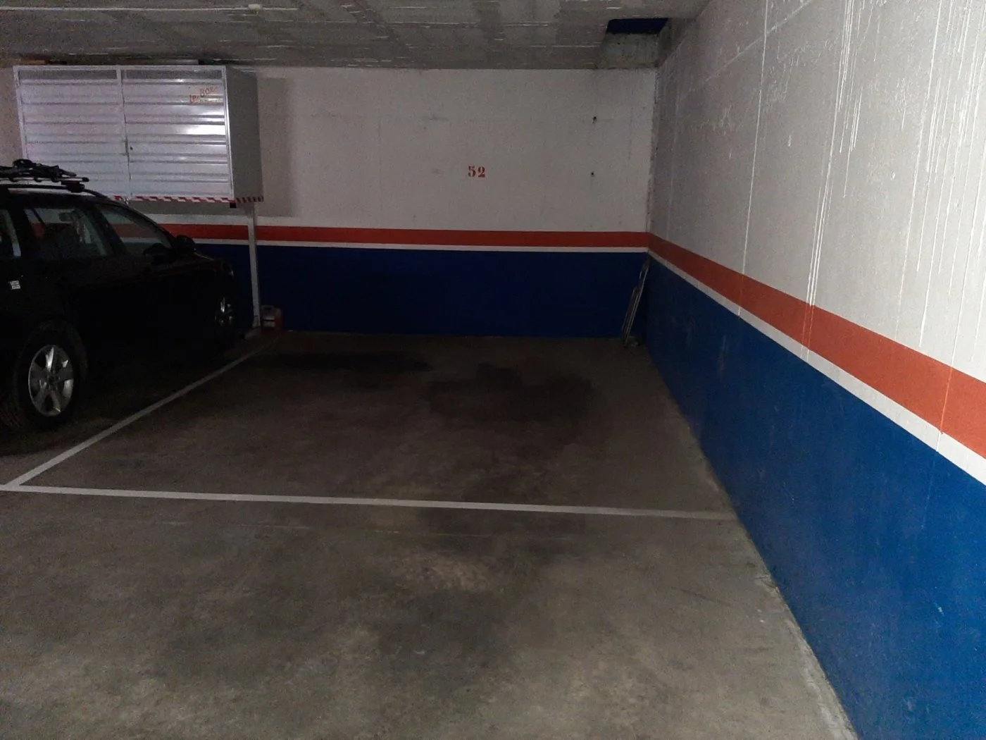 Amplia plaza céntrica de garaje de 18 m²