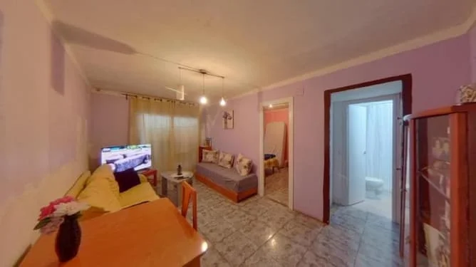 Piso céntrico alquilado de tres habitaciones