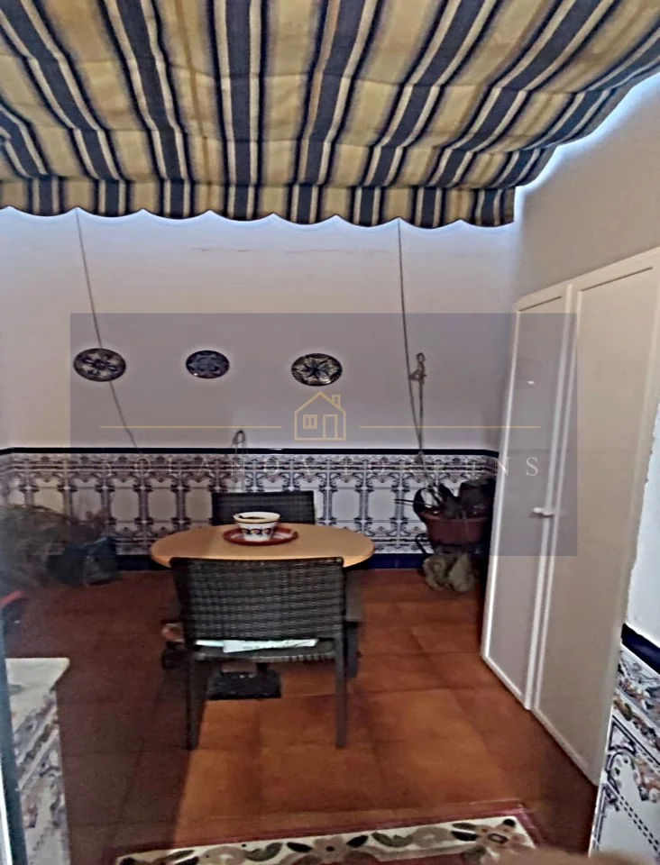 Casa céntrica de tres dormitorios con garaje