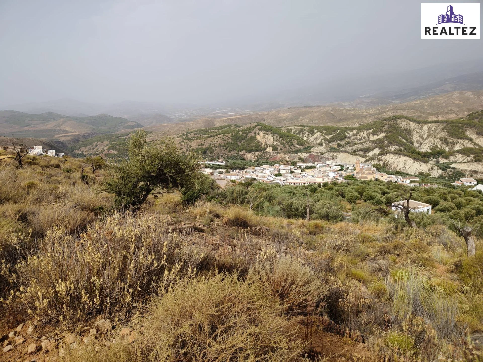 Rural Alcolea plot with sea views