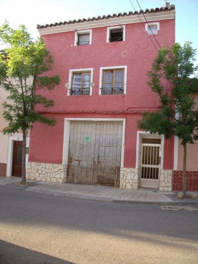 Three-storey house with garden