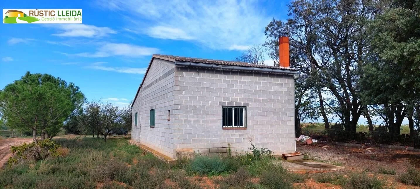 Almacén con finca rústica de regadío