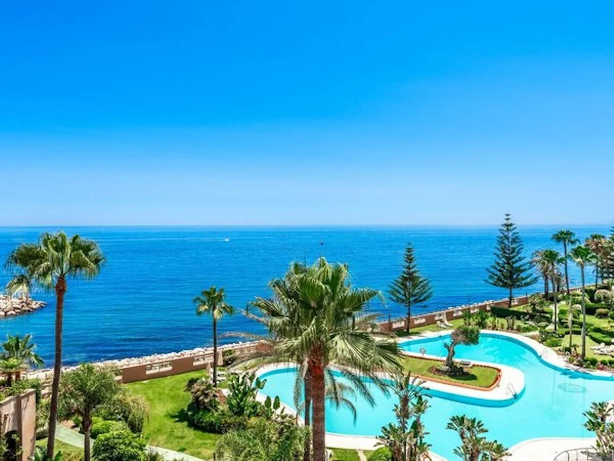 Luxury beachfront apartment with private garden