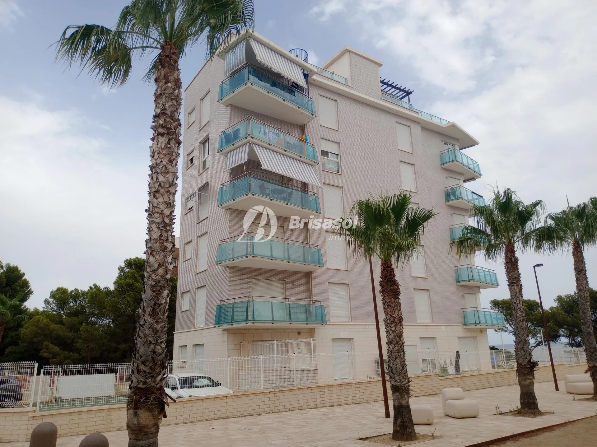 Seafront apartment with communal pool