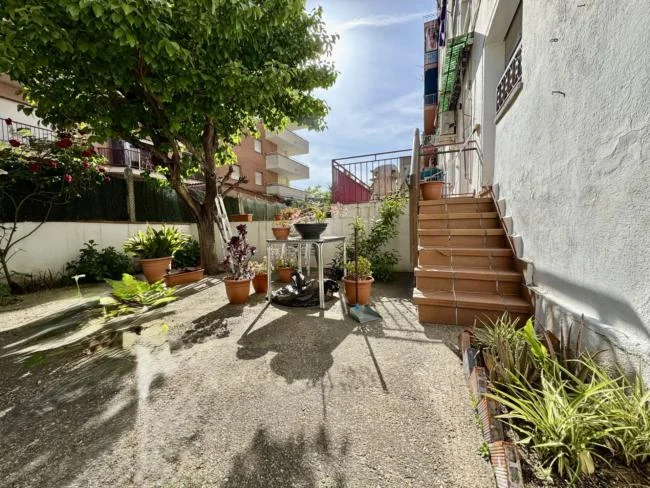 Piso céntrico en planta baja con jardín