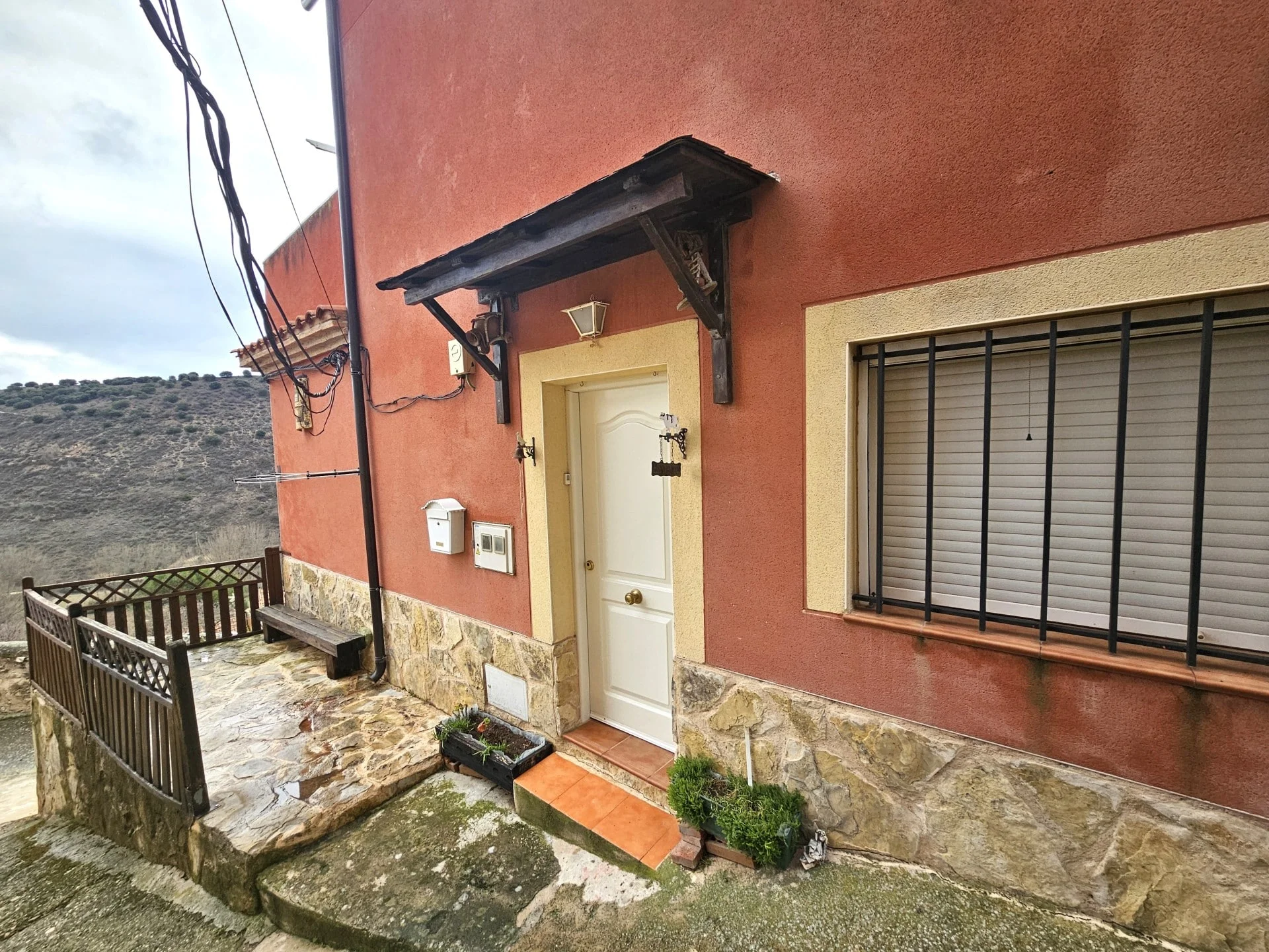 Two-property village house with conversion upside
