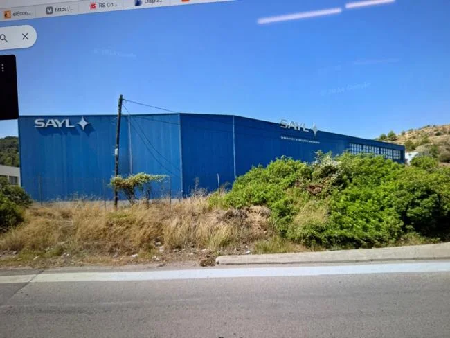 Large industrial warehouse with offices