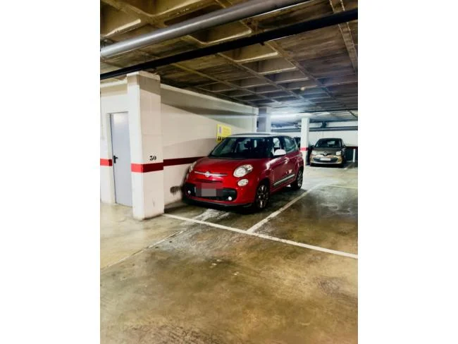 Centre parking space for small car