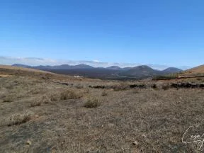 Rustic Uga plot with mountain views