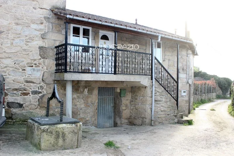 Casa adosada rural con grandes parcelas