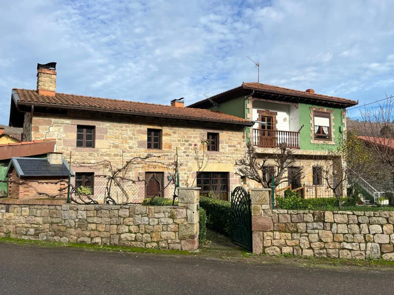 Three-home property with communal garden