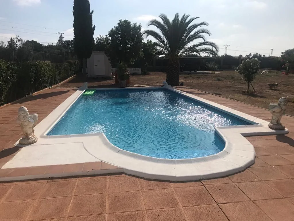 Fenced plot with pool near Almendralejo