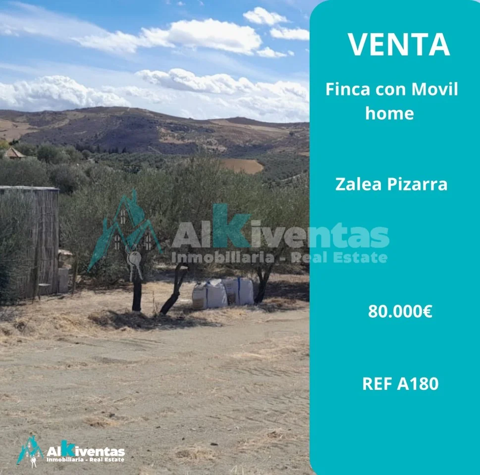 Terreno rústico con casa móvil