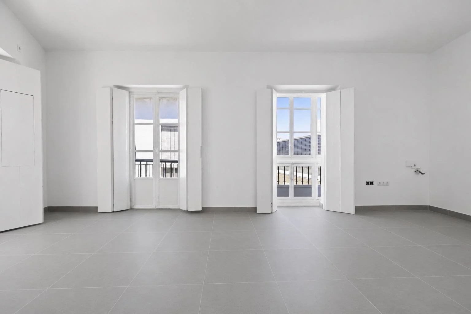 Renovated Centro flat with bright corner views