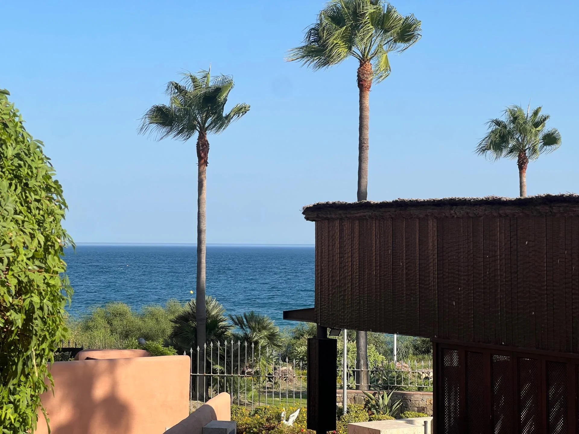 Beachfront apartment with private garden