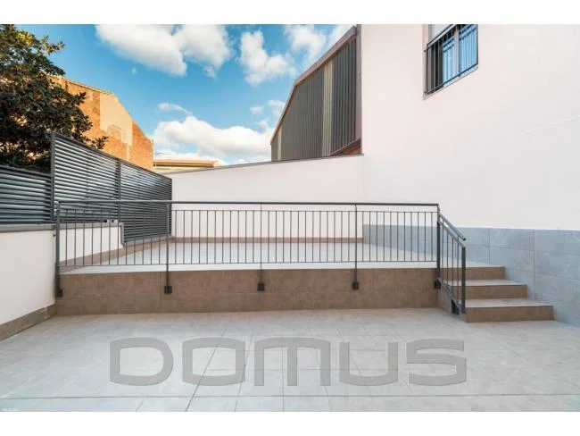 New-build ground-floor flat with terrace