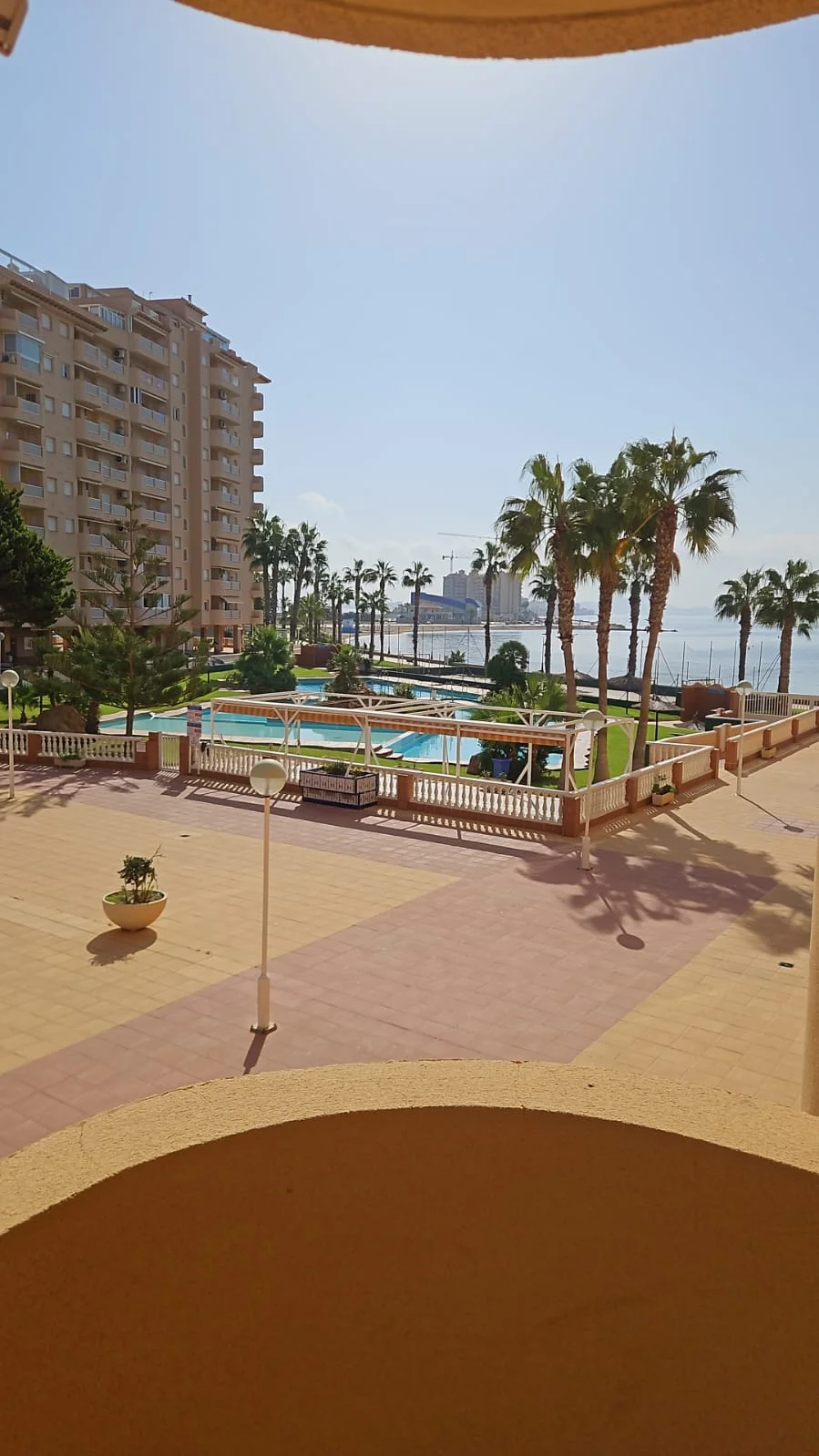 Sea-view apartment with communal pool