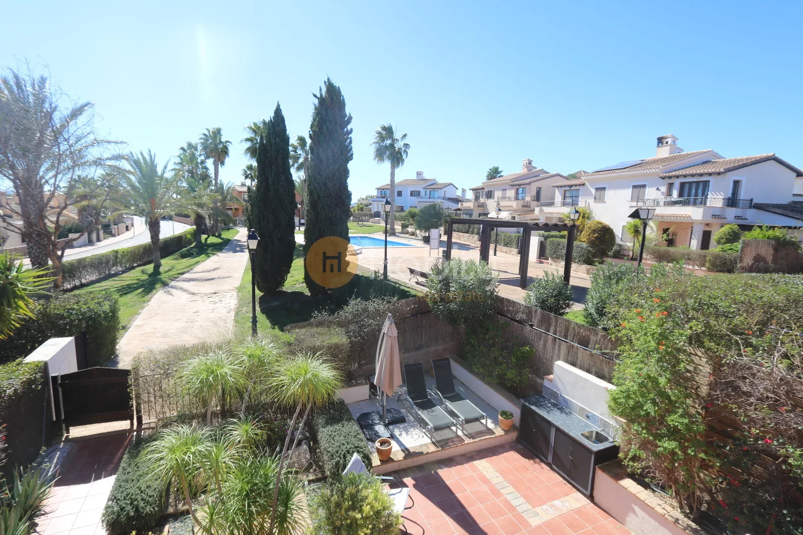 Villa en resort de golf con jardín privado