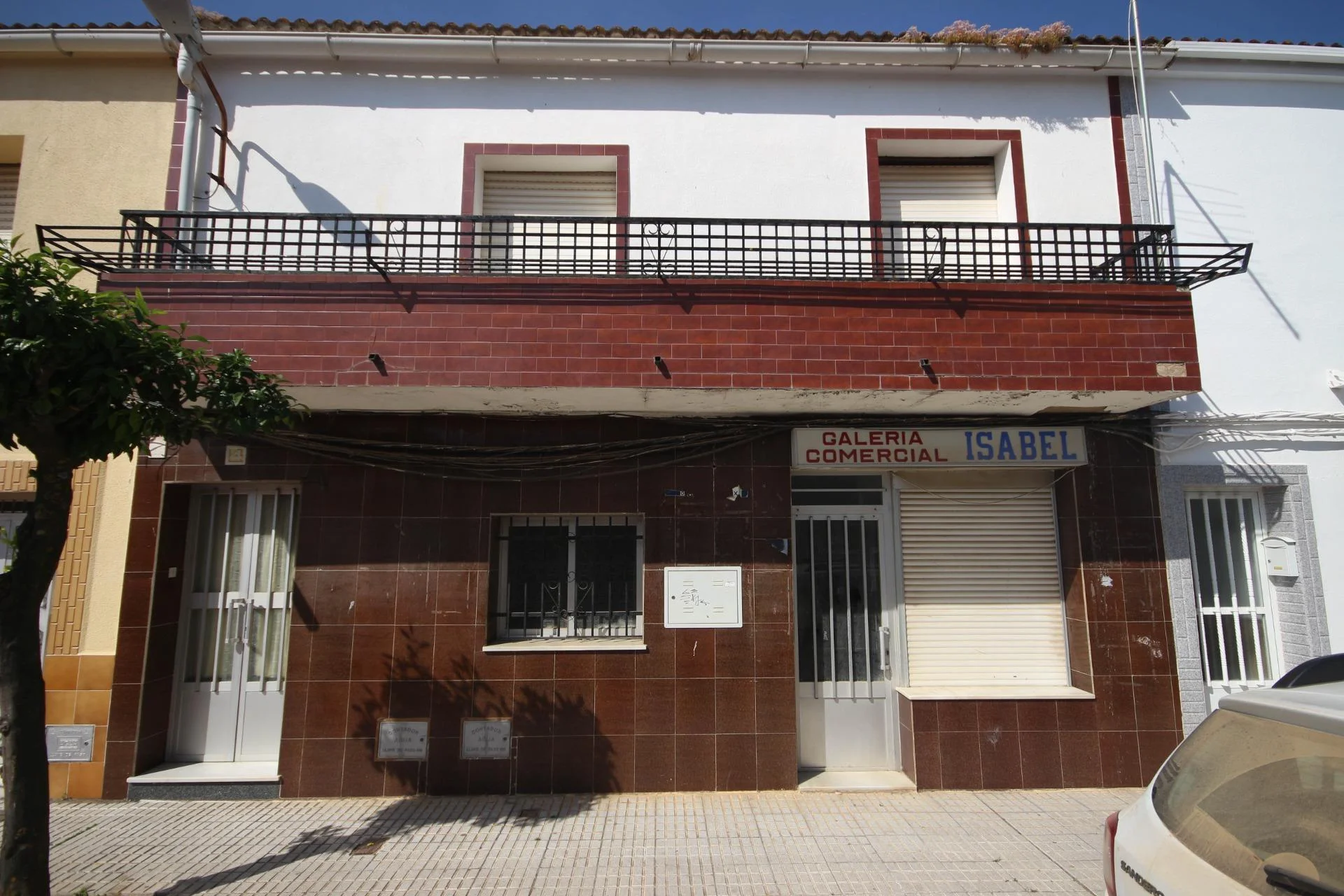 Two-storey building with commercial premises