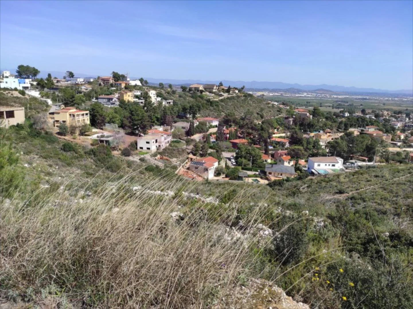 Urban Calicanto plots with valley views