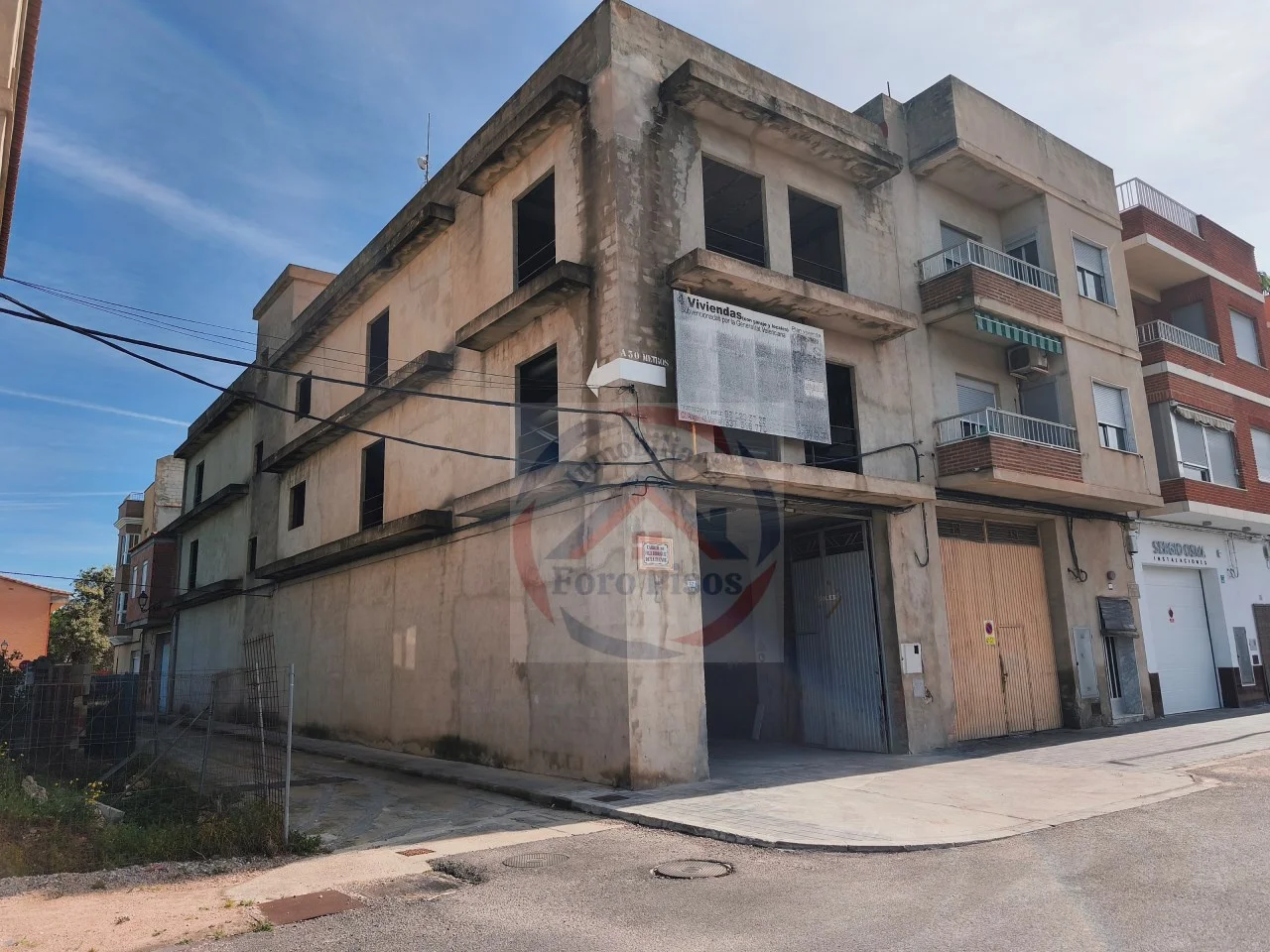 Under-construction building with redevelopment potential