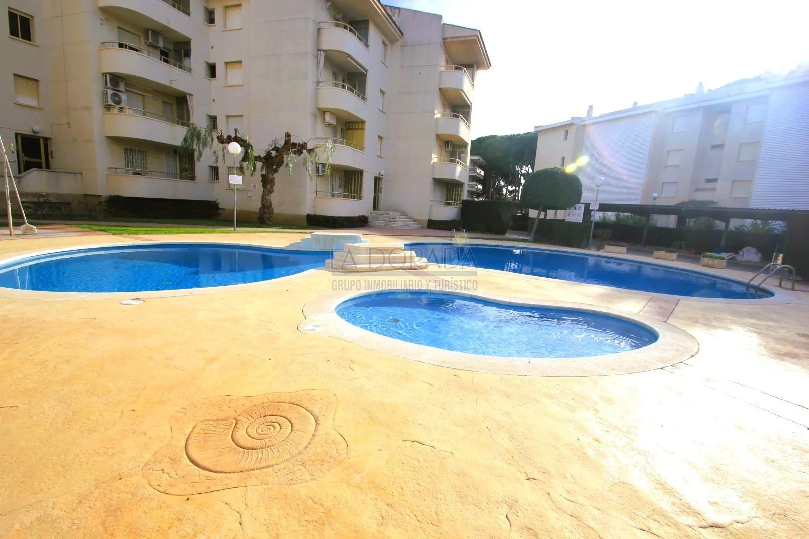 Coastal apartment with communal pool