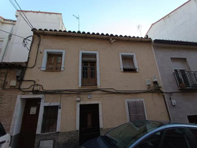 Four-bedroom house with development potential