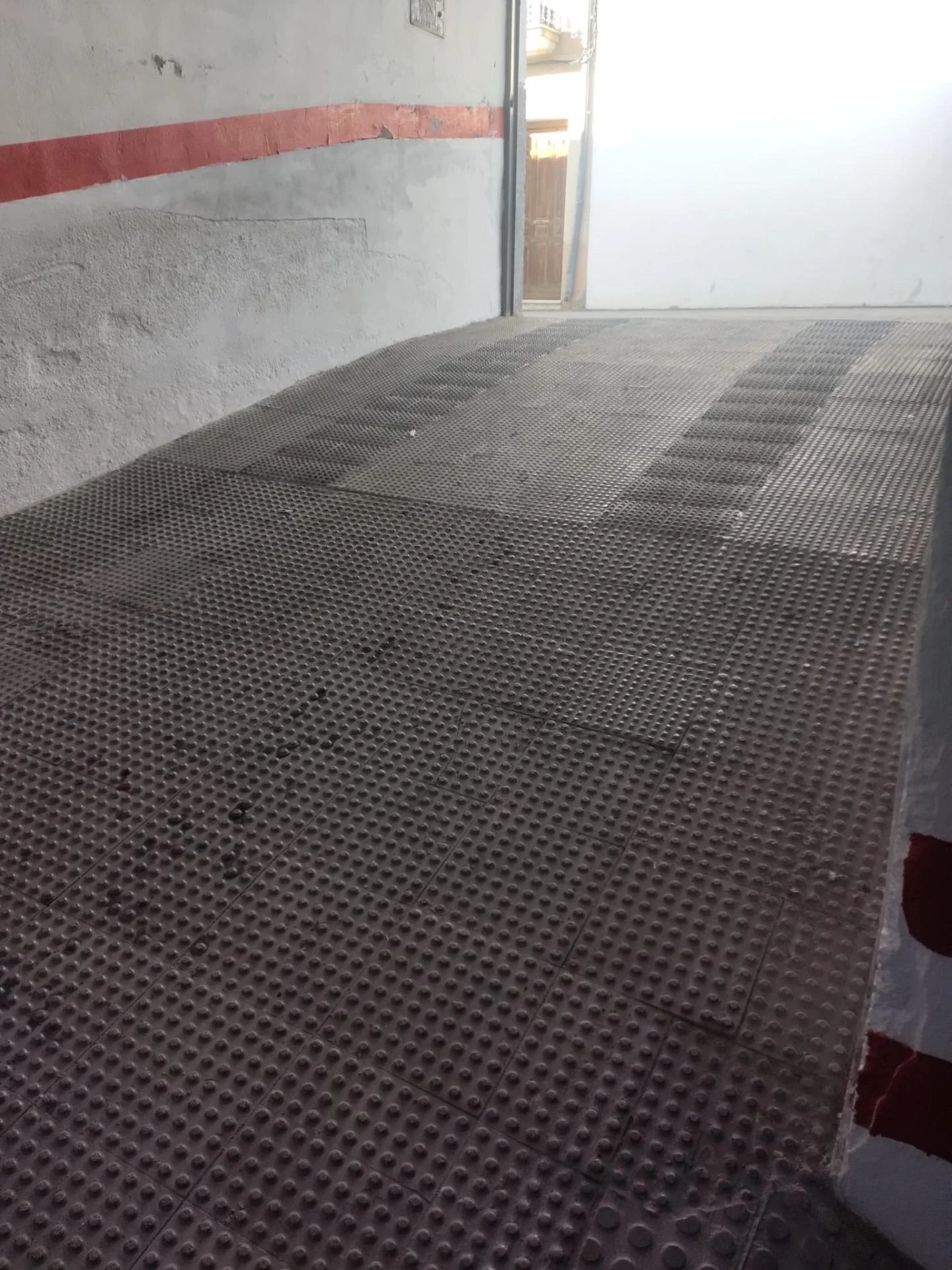 Two central parking spaces, 24 m²