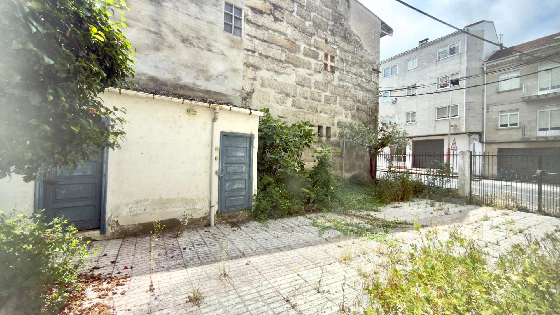 Stone building with three-unit potential