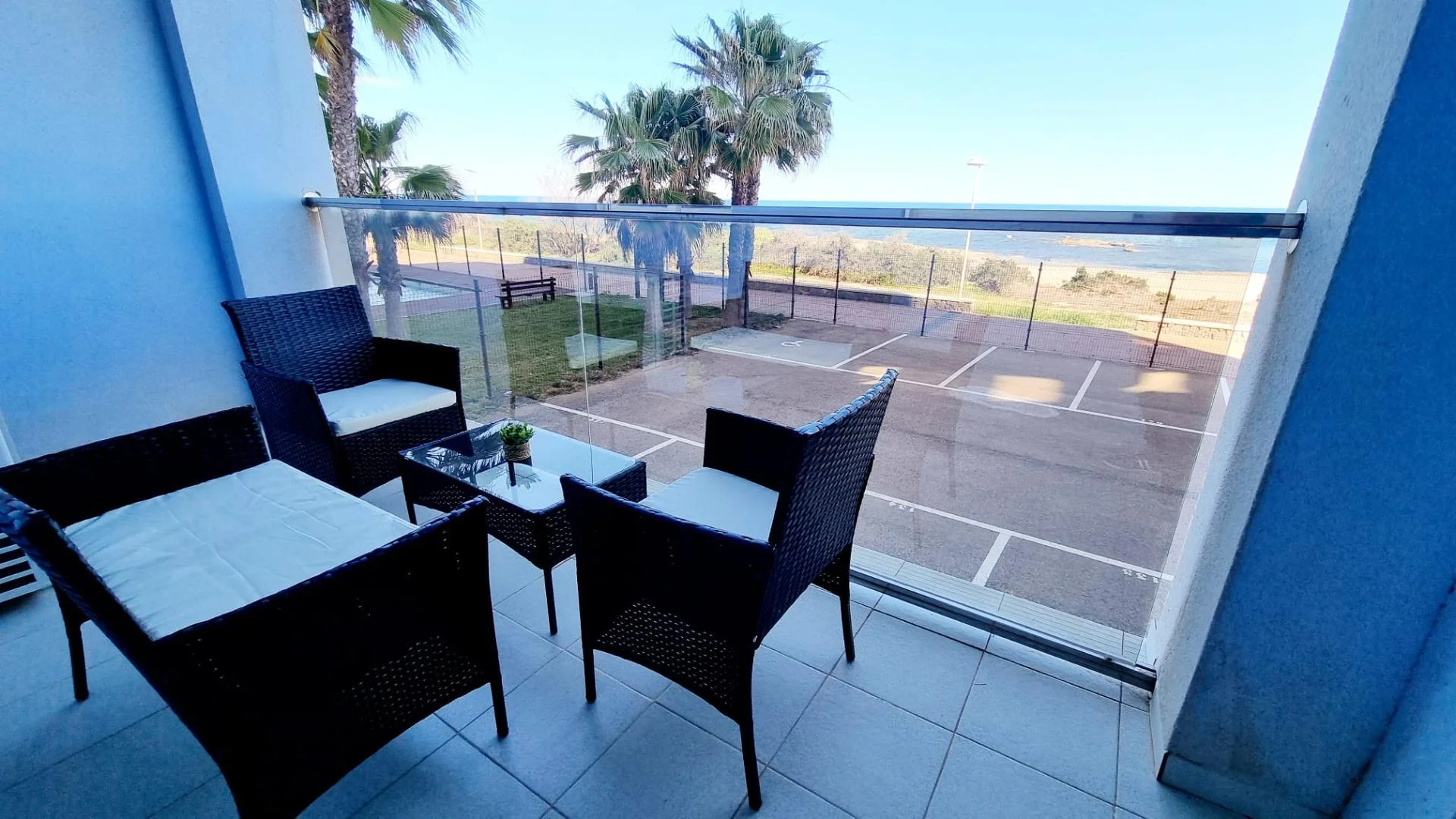 Coastal flat with communal resort amenities
