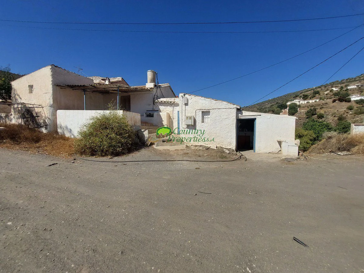 Casa rústica con ruina adosada