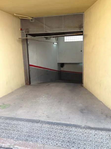 Two adjoining garage spaces in centre