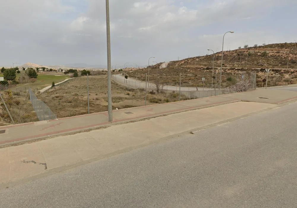 Urban golf plots with mountain views