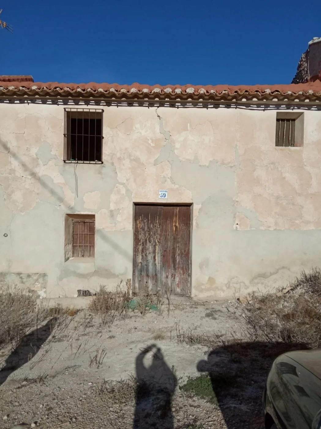 Urban finca with house and land