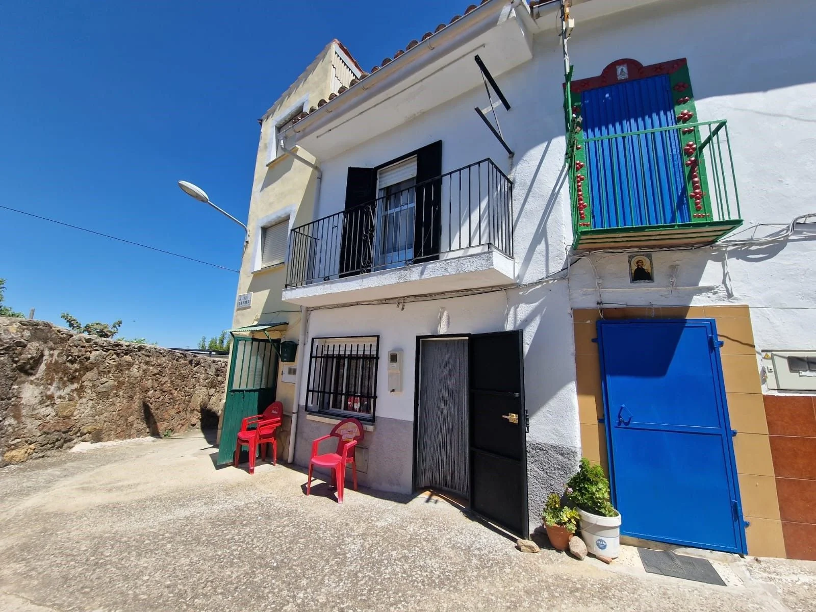 Casa de cuatro dormitorios con buhardilla
