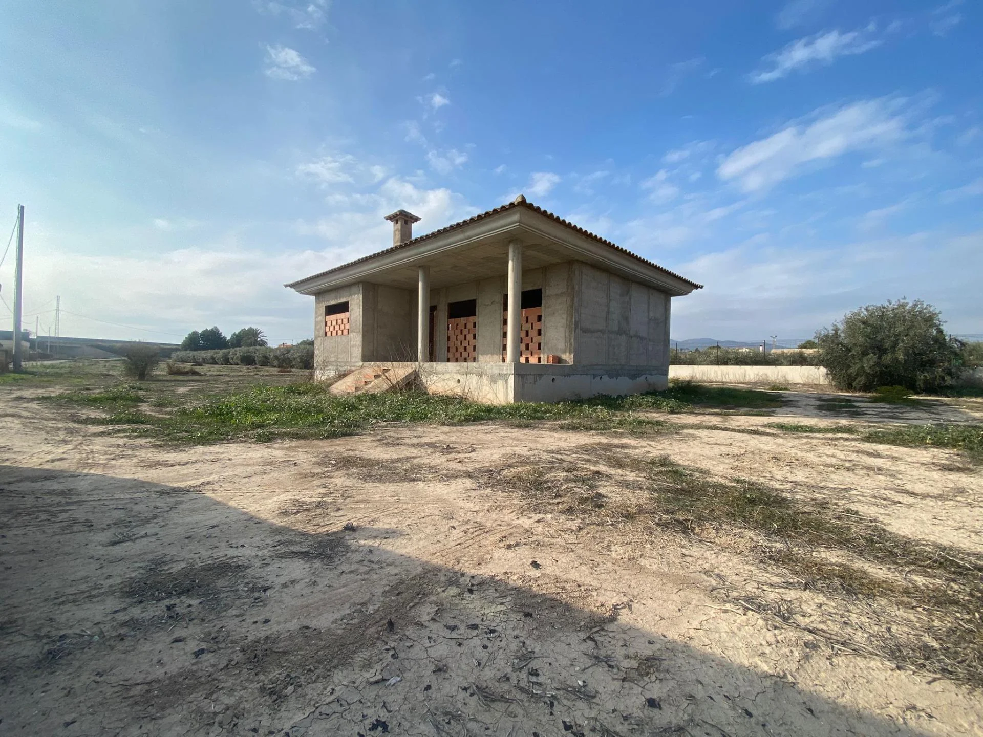 Non-flood-zone plot with house project