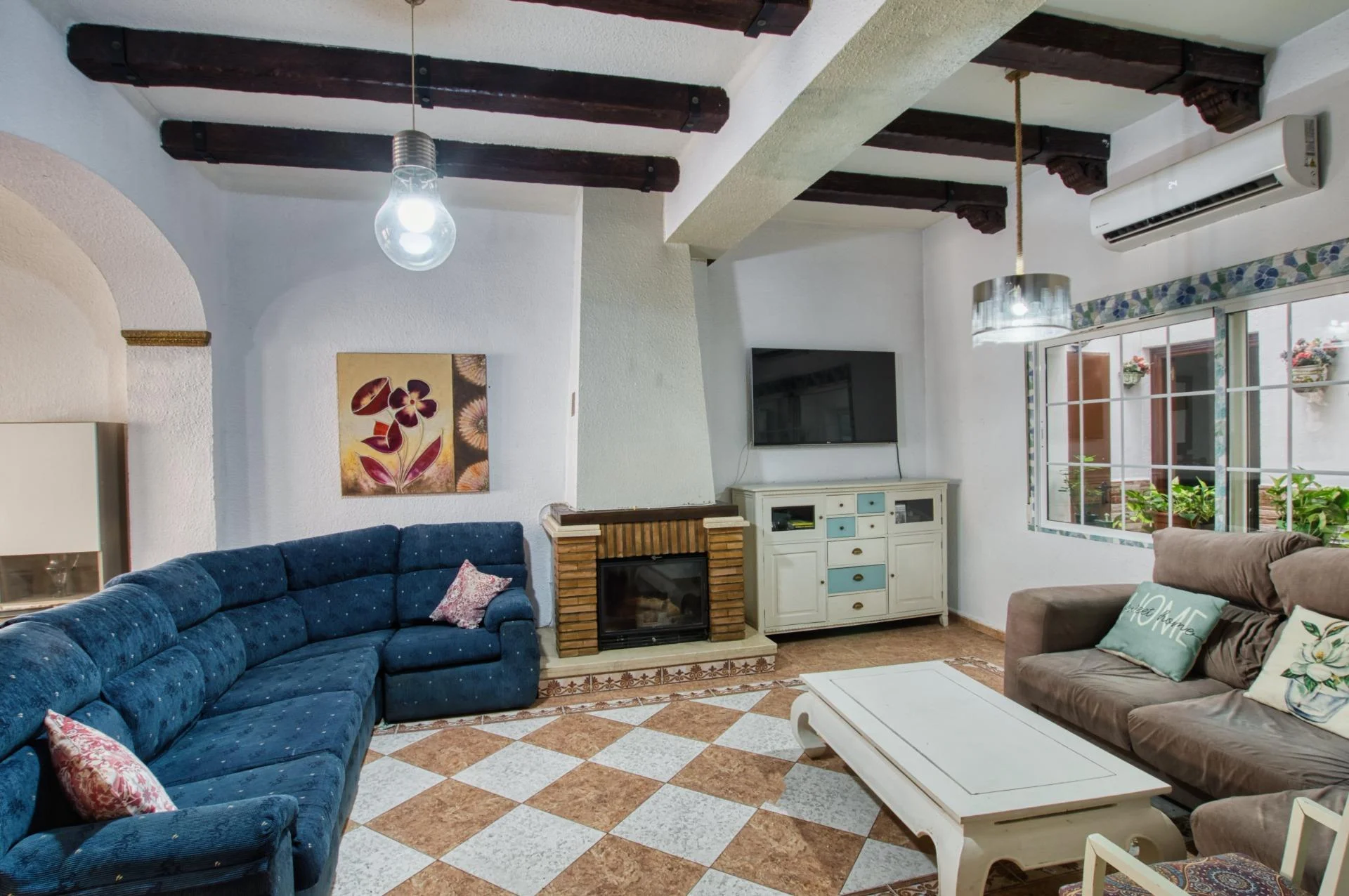 Casa de tres plantas en Málaga con terraza de 60 m²