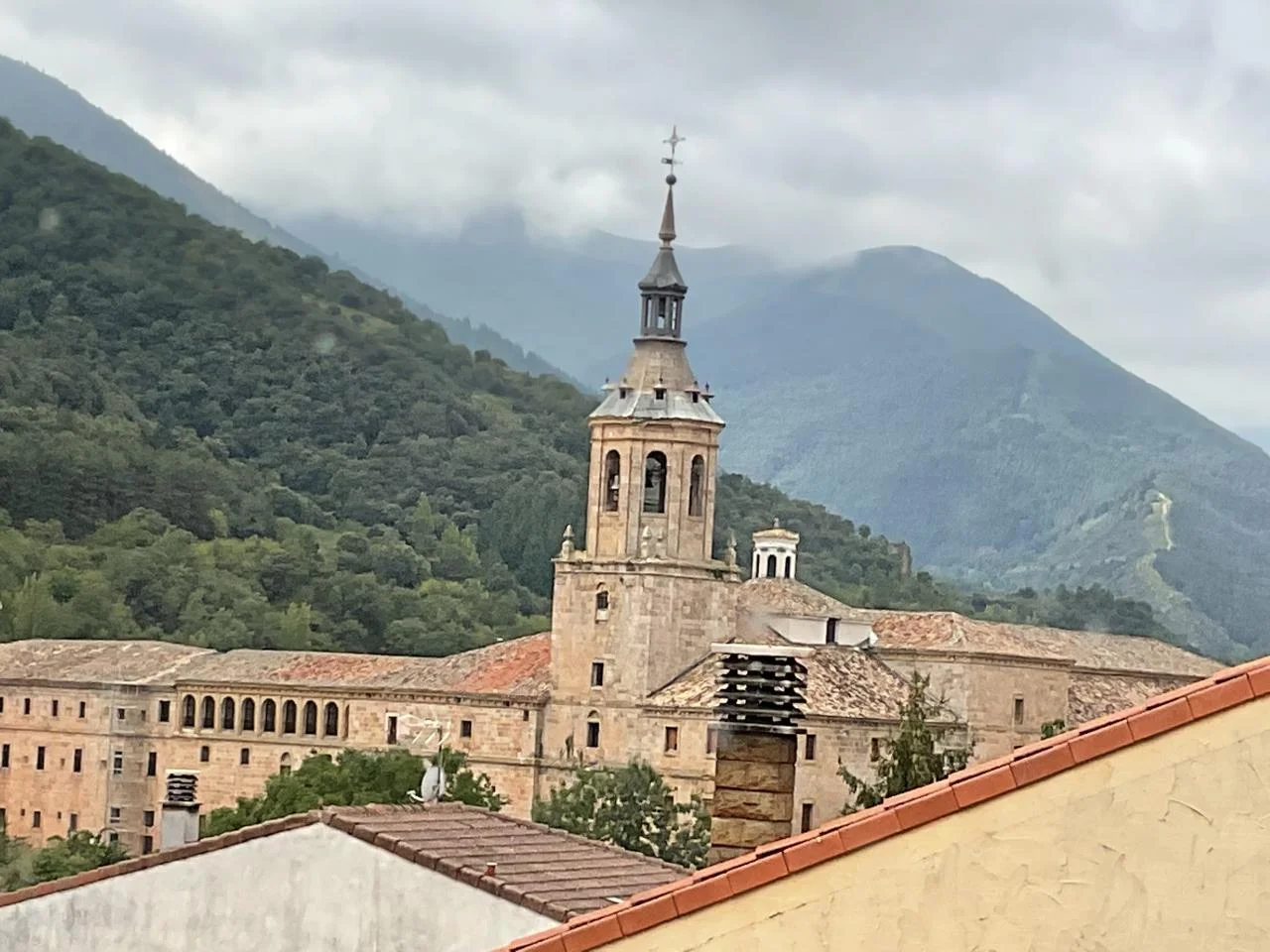 Large central house with monastery views