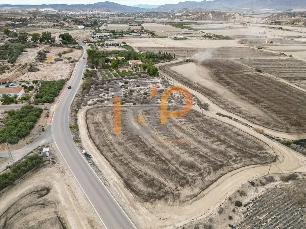 Rustic plot with roadside visibility