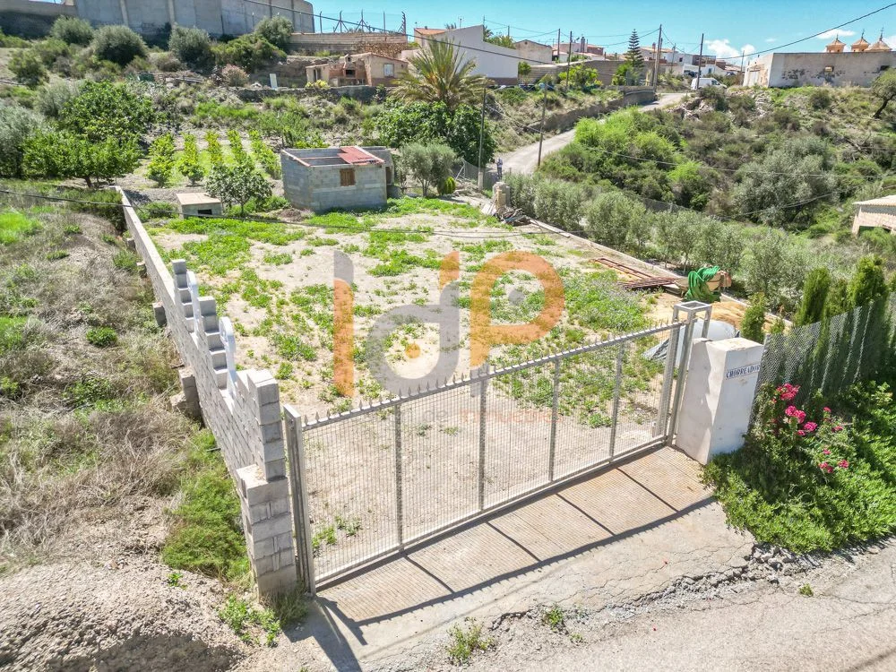 Fenced rural plot near Santa María