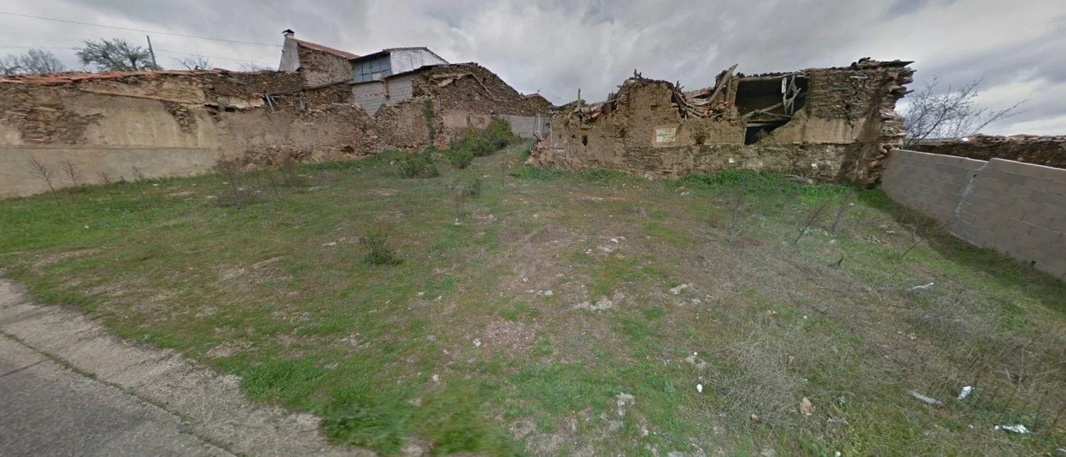 Parcela urbana con construcción existente