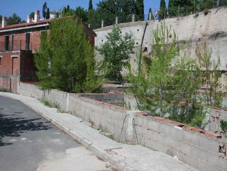 Unfinished building with 14-unit project